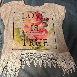 Shirt with quote on the front and flowers